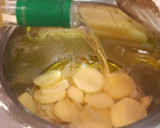 Foto del paso 4 de la receta: Calamares salteados al pesto sobre cama de patatas