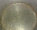 A picture of step 3 of Jalebi with hot milk.