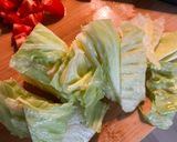 A picture of step 1 of Tomato and Lettuce Zōsui (Japanese Rice Porridge).