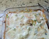 A picture of step 11 of Bourbon barbecue chicken lasagna roll ups.