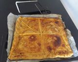 Foto del paso 14 de la receta: 🌯Empanada de bacalao, pasas y almendras con masa casera 🐟🍇🥜