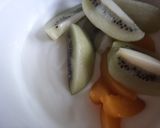 A picture of step 1 of Curd with fruits and honey.
