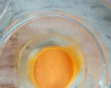 A picture of step 1 of Orange and Mango Slush.