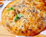 A picture of step 4 of Qeema Naan.