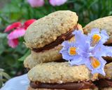 Foto del paso 4 de la receta: Alfajorcitos de coco, avena y dulce de leche💕