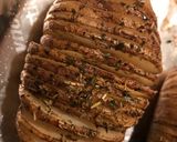 A picture of step 11 of Herbal Hasselback potatoes.