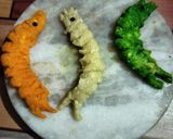 A picture of step 3 of Tri color shrimp shape pitha.