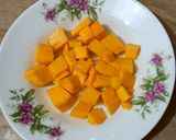 A picture of step 4 of Vanilla custard with mango cubes 🥭🍨.