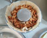 A picture of step 4 of Chicken stuffed tortilla bundt cake.