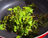 A picture of step 4 of Eggplant and King Oyster Mushrooms Stir-Fried with Basil.