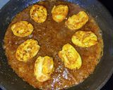 A picture of step 10 of Egg tawa masala.