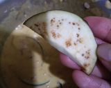 A picture of step 3 of Baingan k pakorey.
