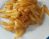 Foto del paso 6 de la receta: Patatas estilo fritas pero al horno