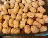 A picture of step 1 of Hot dog tater tot casserole.