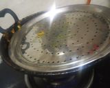A picture of step 4 of Dahi wali bhindi.