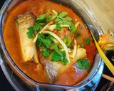 A picture of step 14 of Beef paya.