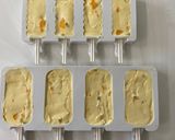 A picture of step 3 of Mango and Passion Fruit Shrikhand Popsicles.