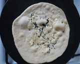 A picture of step 6 of Garlic tandoori roti on tava.