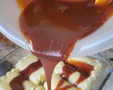 A picture of step 8 of Bourbon barbecue chicken lasagna roll ups.
