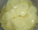 A picture of step 2 of Potato Parmigiana with Ham and Cheese.