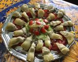 Une image de l'étape 10 de Salade de coeurs d'artichauts aux tomates, concombre et fleurs de thym.