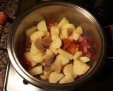 Foto del paso 6 de la receta Patatas con ajos y pescado con pimientos picantes