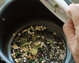 A picture of step 1 of Whole Jowar Upma in Pressure cooker.