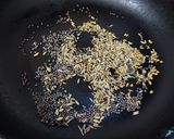 A picture of step 1 of Sweet and Spicy Amla Chutney.