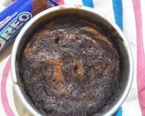 A picture of step 7 of Orange Oreo Biscuit Marble Cake.