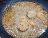 A picture of step 11 of Garlic Sautéed Scallop and Shrimp Pasta.