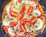 Foto del paso 2 de la receta Pizza ligera con base de zanahoria al sartén