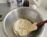 A picture of step 2 of Blueberries and vanilla frosted cup cakes.