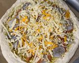 A picture of step 2 of Seafood Pizza.
