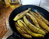 A picture of step 6 of Qeema Bharay Karele.