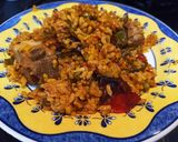 Foto del paso 4 de la receta: Arroz con costillejas, judías verdes y guisantes