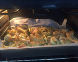 Foto del paso 6 de la receta: Alitas y muslitos de pollo rustídas con patatas a la panadera al horno