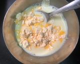 A picture of step 2 of Mango custard with gulab jamun.