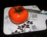 Foto del paso 1 de la receta: Kaki flambeado con wiski, coco rallado y salsa de maracuyá