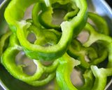 A picture of step 1 of Spicy & Zesty Potato Stuffed Capsicum Rings.