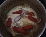 A picture of step 6 of Tomato Sausage Soup.