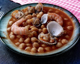 Foto del paso 4 de la receta: Receta de Garbanzos con gambones y berberechos
