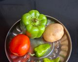 A picture of step 1 of Capsicum Sabzi.