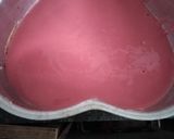 A picture of step 2 of Eggless heart shape red velvet cake.