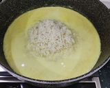 A picture of step 2 of Milky pilaf with salty fish.