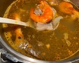 A picture of step 2 of Banh Canh with Crab and Pork Hock.