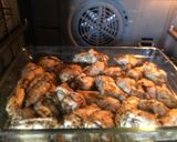 Foto del paso 8 de la receta: Alitas de pollo especiadas y en salsa