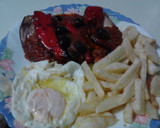 Foto del paso 4 de la receta: Bonito frito con cebolla, tomate y aceitunas al romero