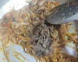 A picture of step 8 of Karela Pyaz.