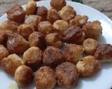 A picture of step 5 of Phulkopi,aloo diye Chhanar Dalna.