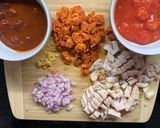 A picture of step 1 of Smoky QuesadillasChicken & chorizo /Jackfruit & veggie sausages.